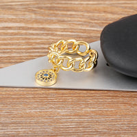 Anillo Ojo Turco Colgante y Mano de Fátima