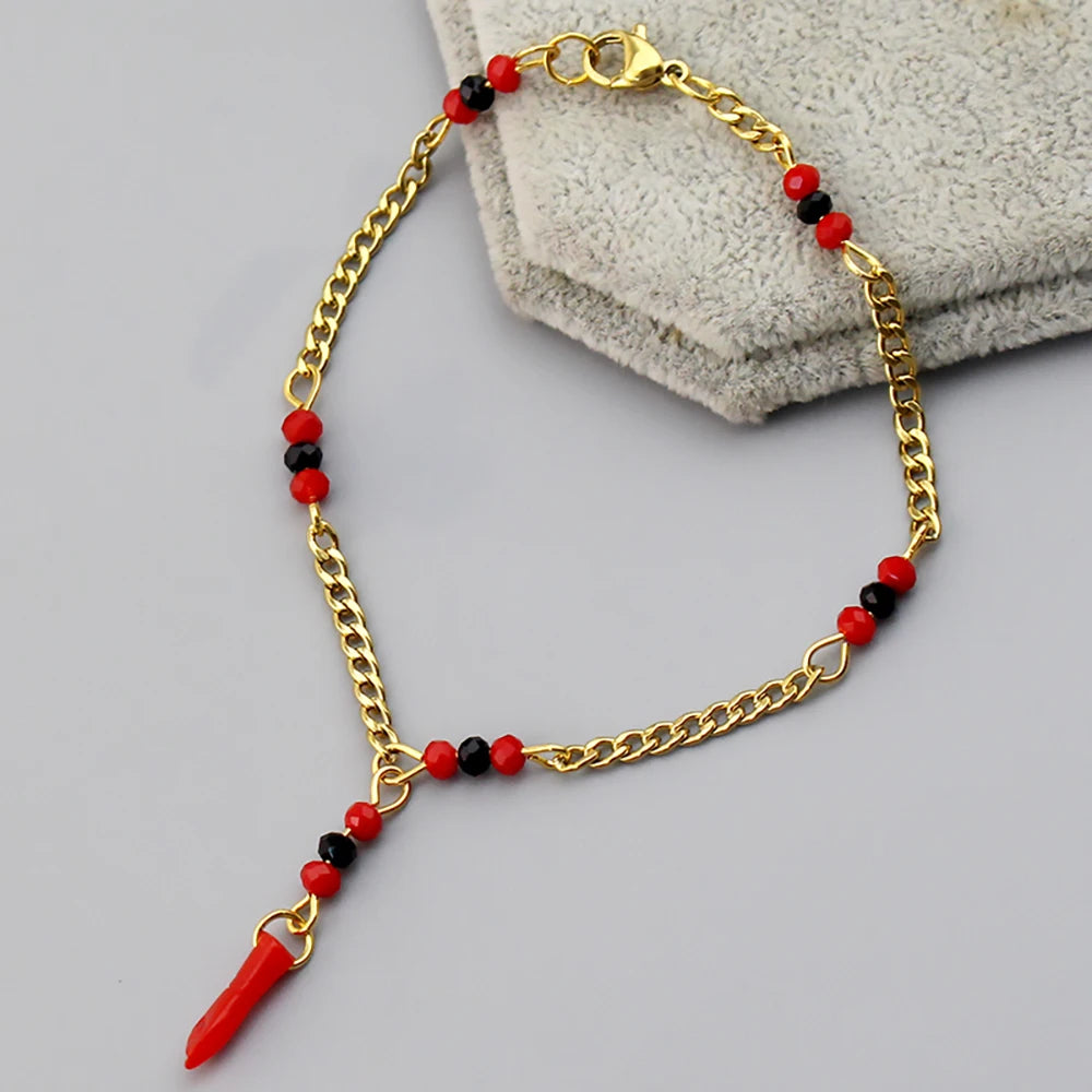 Pulsera de azabache con cuentas rojas