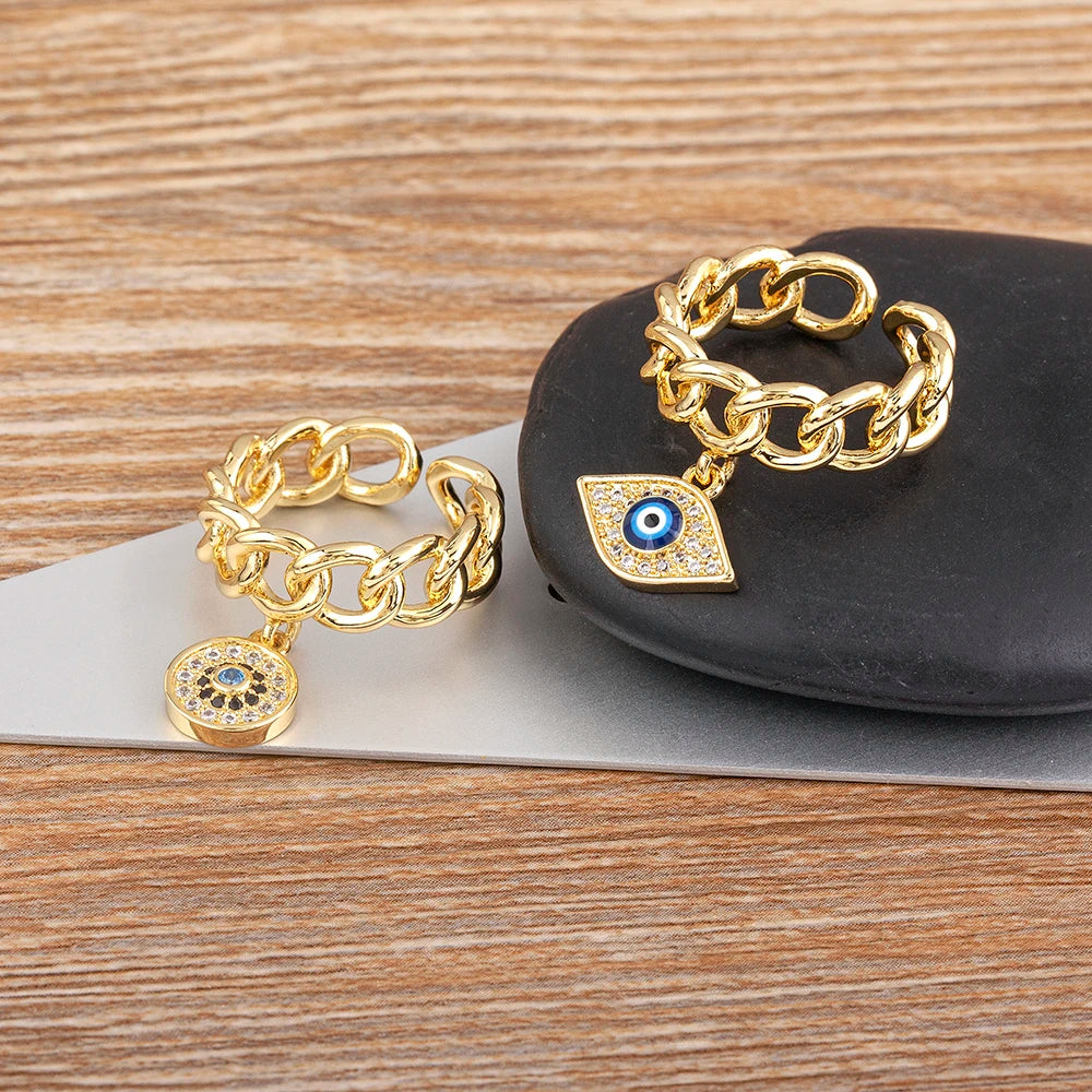 Anillo Ojo Turco Colgante y Mano de Fátima