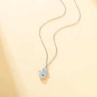 Collar con colgante de la mano de Hamsa, de acero inoxidable con baño de oro de 18 quilates, para mujer, con circonita azul y amuleto de la mano de Fatima, inspirado en Skyrim.