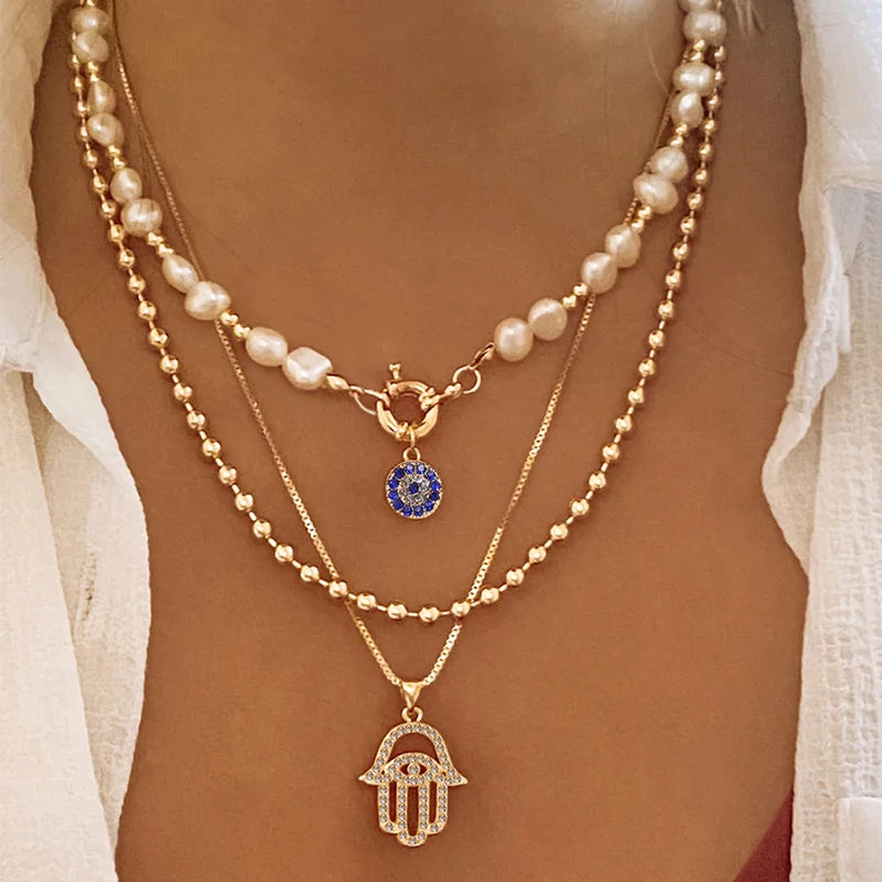 Collar con colgante de Palma de ojos malvados azules de la suerte turco con sentido del diseño para mujer, elegante collar de perlas de imitación, joyería multicapa