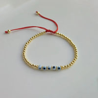 Pulsera de Ojo Turco en Hilo Rojo