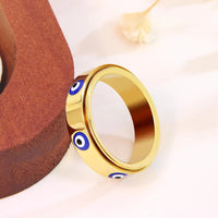 Anillo Giratorio Ojo Turco Calma Dorada