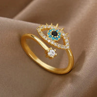 Anillo Ojo Turco Cristal Dorado y Plateado
