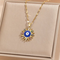 Collar de ojo de diablo de estilo bohemio popular con incrustaciones de collar de acero inoxidable de circón de colores con colores aleatorios
