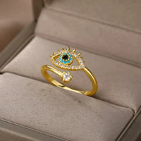 Anillo Ojo Turco Cristal Dorado y Plateado