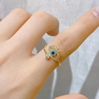 Anillo Ojo Turco Cristal Dorado y Plateado
