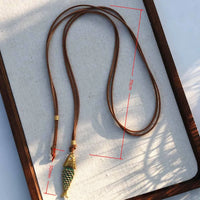 Elegante collar con colgante de ojo de diablo de pez verde con articulaciones móviles con cuerda marrón, cadena larga para suéter, joyería de moda para mujer