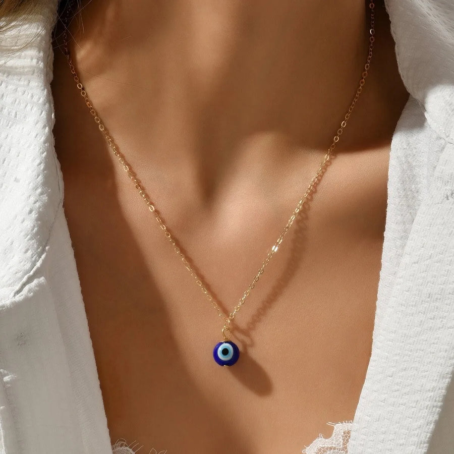 Collar étnico minimalista de moda chapado en oro de acero inoxidable con ojos de diablo, collar redondo con colgante de ojos malvados azules para mujer