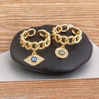 Anillo Ojo Turco Colgante y Mano de Fátima