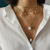 Collar con colgante de Palma de ojos malvados azules de la suerte turco con sentido del diseño para mujer, elegante collar de perlas de imitación, joyería multicapa