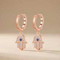 Aretes Mano de Fátima Ojo Turco Milagro Brillante