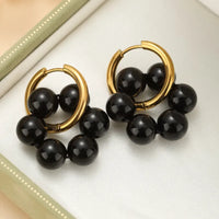 Aretes Obsidiana Escudo Refinado