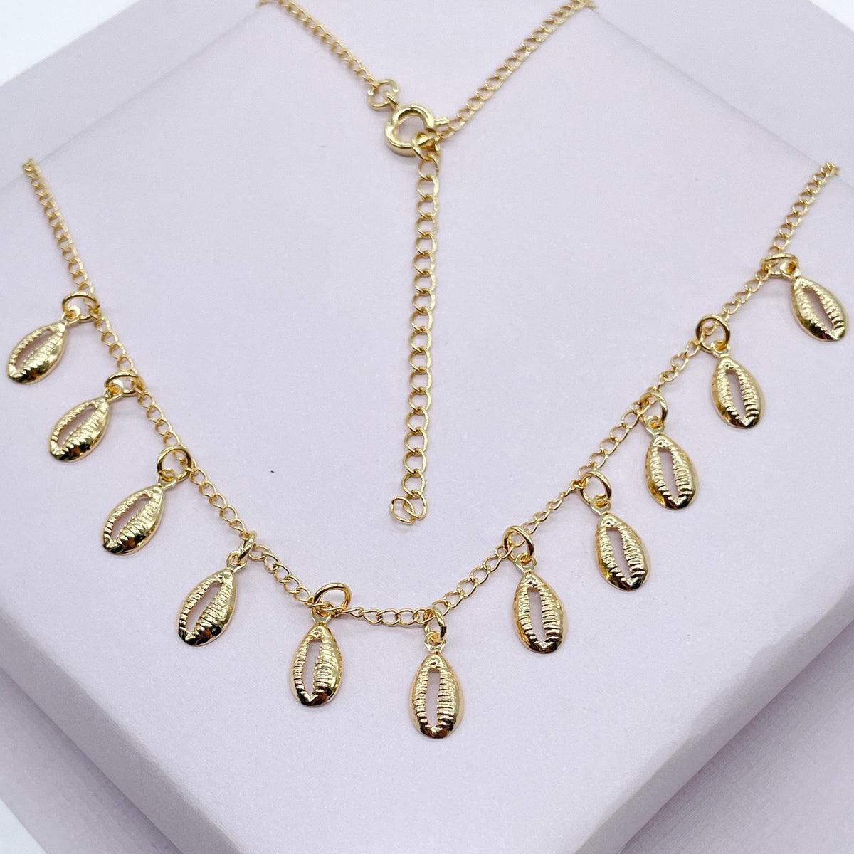 18k Gold Layered Dainty Chain with Eleven Extra Light Cowrie Shell Charms,