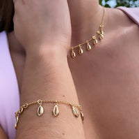 18k Gold Layered Dainty Chain with Eleven Extra Light Cowrie Shell Charms,