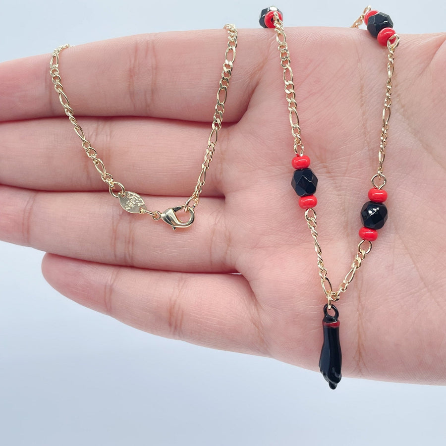 18k Gold Layered Figaro Necklace Featuring Black "Figa", Red Beads, Simulated