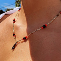 18k Gold Layered Figaro Necklace Featuring Black "Figa", Red Beads, Simulated