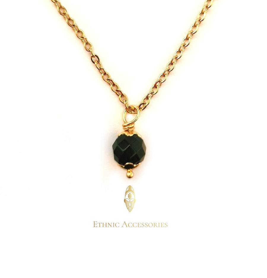Collar Ogri ai, collar surinamés, boto keti, collar de ónix, collar contra el mal de ojo, joyería surinamesa, collar de cuentas, joyería ogri ai, ónix