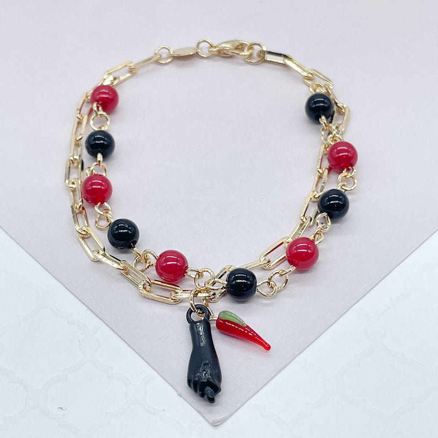 Pulsera Ají y Mano Figa Cuentas Negras y Rojas Oro 18K