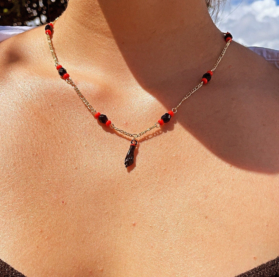 18k Gold Layered Figaro Necklace Featuring Black "Figa", Red Beads, Simulated