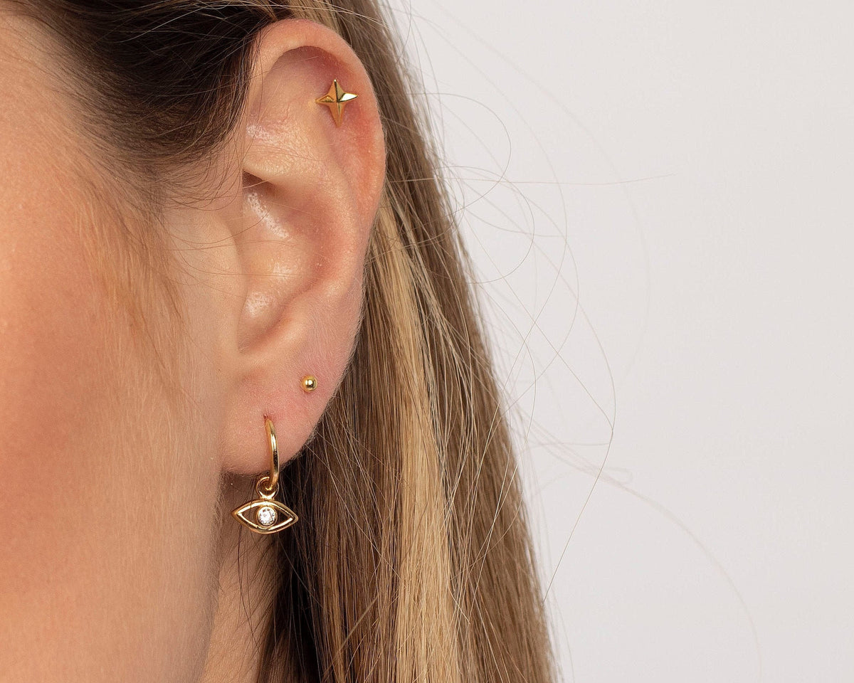 Aretes Huggie Ojo Turco Circonita Delicada