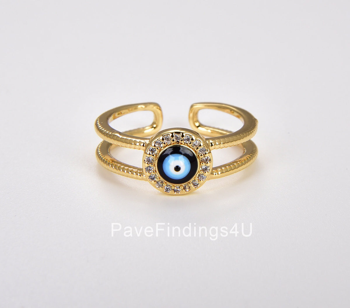 Anillo Ojo Turco Negro Circonita Dorado