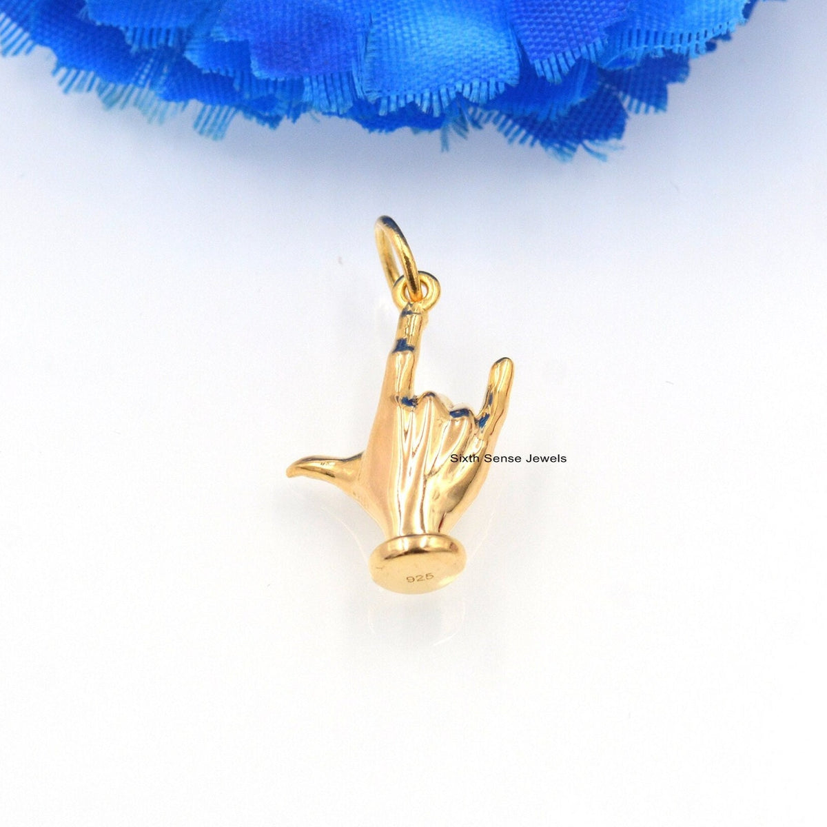 Colgante con dije de mano de Figa en oro de 14 quilates: Joyería Mano Fico