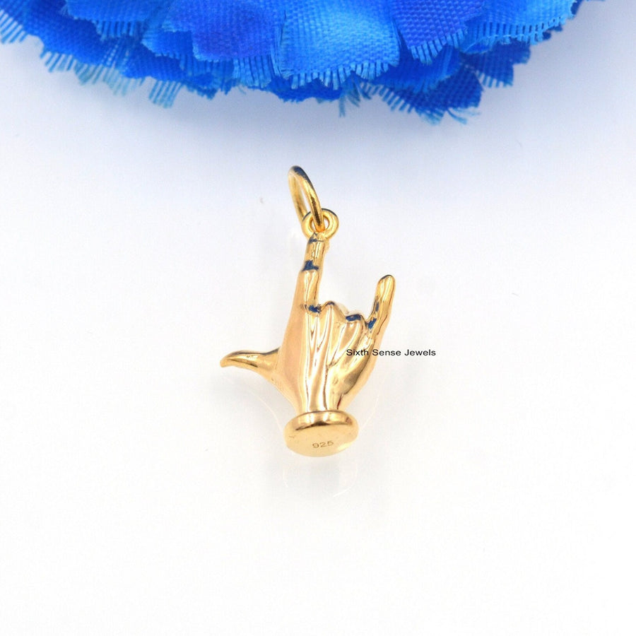 Colgante con dije de mano de Figa en oro de 14 quilates: Joyería Mano Fico