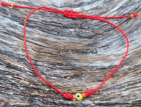 Pulsera Hilo Rojo Ochún con Ojo Turco