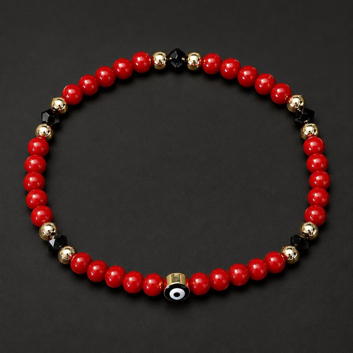 Pulsera Azabache Coral Rojo y Ojo Turco Oro 14K