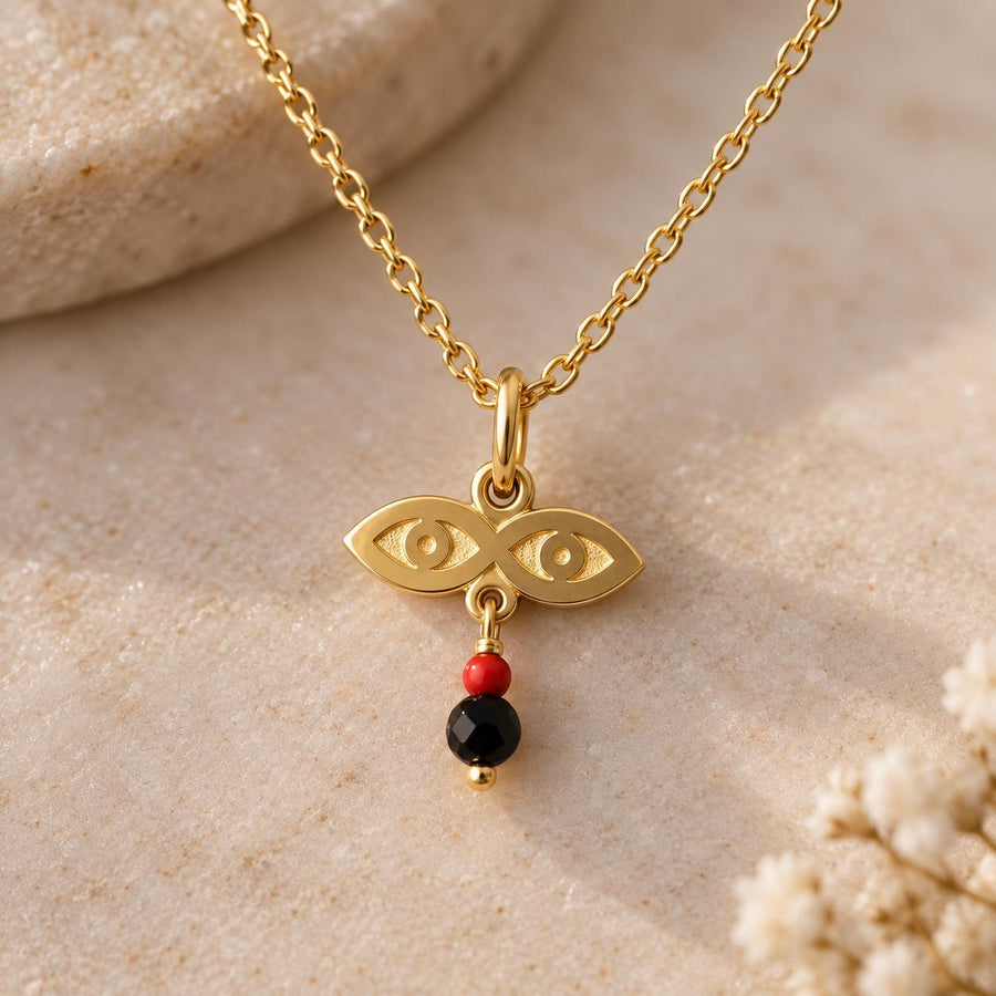 Colgante de oro macizo de 14k con los Ojos de Santa Lucía, dije de cuentas de azabache rojas y negras, regalo de protección para un recién nacido o para ella.